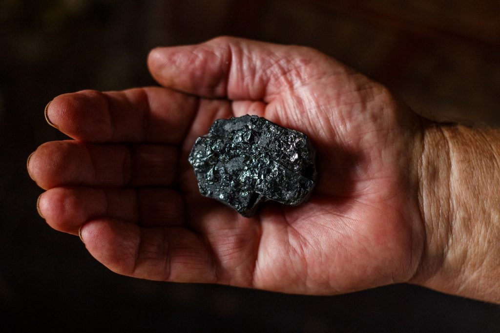 Coal in man's hand